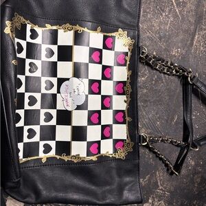 Chic Black and White Checkered Tote with Pink Accents